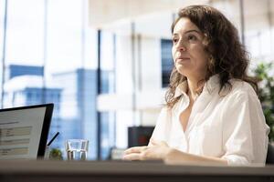 Human resources employee hiring candidate after determining he possesses skills needed to fulfil role. Talent acquisition expert evaluating if applicant qualifications align with company photo