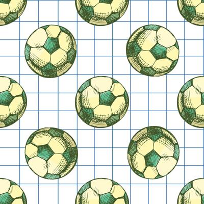 Hand drawn vintage seamless pattern of soccer balls in yellow and green on grid notebook background, sketch