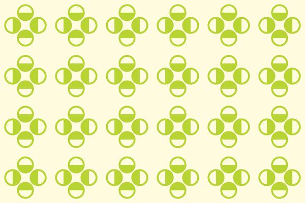 A pattern with green circles on a yellow background