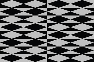 A black and gray pattern with diagonal lines and triangles vector