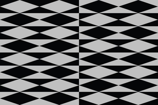 A black and gray pattern with diagonal lines and triangles