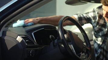 Man Cleaning Car Dashboard with Cloth video
