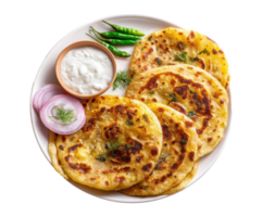 Delicious aloo paratha served with yogurt and green chilies png