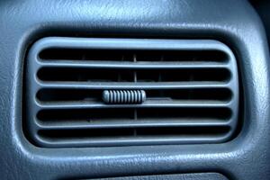 Close up black color retro style car air vent detail and design in Thailand. photo