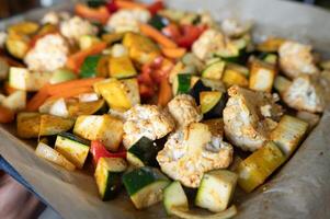 Oven-roasted mixed vegetables with cauliflower, zucchini, and peppers photo
