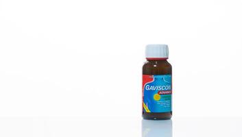 CHONBURI, THAILAND-JANUARY 30, 2023 Gaviscon Advance liquid antacid bottle. Sodium alginate medicine for heartburn indigestion and GERD treatment safe during pregnancy. Treatment for acid reflux. photo