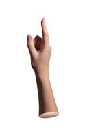 Index finger pointing upward in side view with thumb visible. Close up of female hand showing tap photo