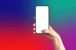 holding a smartphone with screen, displaying a blank mockup. A modern device used for online photo