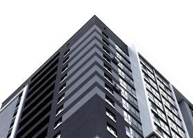 Building corner with modern high rise apartment architecture. Tall white residential structure with photo