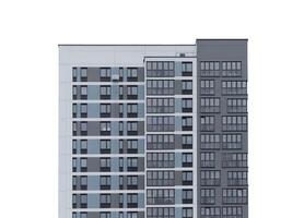 Building with modern apartment facade and geometric windows. Tall modular block representing urban photo