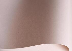 Eco friendly paper with a natural, speckled fiber texture and soft, muted tones. The abstract, wavy photo