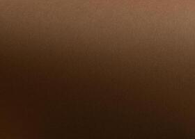 Chocolate brown designer paper sheet with smooth matte texture. Simple, minimalistic background, photo