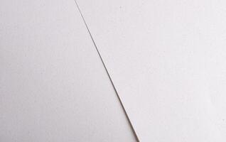 Premium minimalistic pastel paper with a smooth matte surface, offering an elegant monochrome photo