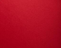 Elegant red designer paper with smooth matte texture. Bright, festive background, minimalistic and photo