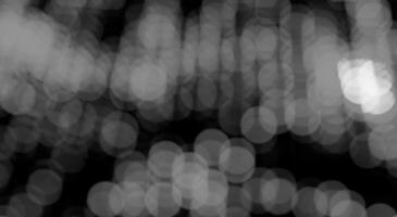 bokeh lights creating a soft, festive glow with a blur of circles and dots. The defocused, twinkling photo