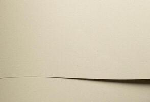 Beige and green recycled designer paper backdrop. Muted, speckled texture with raw, cardboard photo