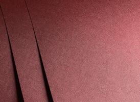 Luxury paper background. Modern red and marsala metallic sheets with glossy gradient, geometric photo