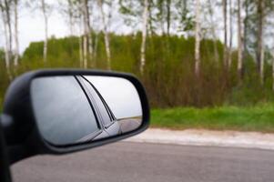 A side view mirror on a car photo