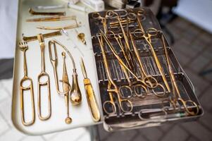 A collection of medical instruments on a table photo