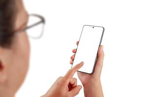 Woman interacting with smartphone, blank screen ideal for app mockups, user interface previews, or digital product presentations photo