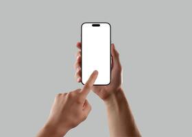 Man hand holding smartphone with blank screen and finger touch gesture on gray background photo