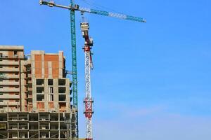 Construction building.New building.Large high rise cranes photo