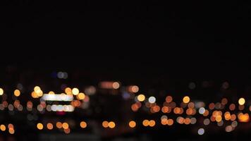 City night light bokeh with colorful blur effect. Bokeh night light. Perfect for backgrounds, modern urban mood, romantic, dreamy, and artistic atmosphere video
