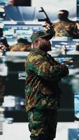 Vertical Black soldier operating in a virtual war zone using digital technology and threat detection tools, showcasing modern military strategy. Secure communications in active operations. Camera A. video