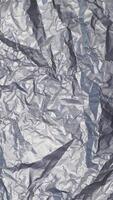 Reflective Silver Foil Background Texture with Crumpled Wrinkles and Light Movement video