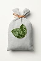 Textured Bag Tied with String Featuring Green Leaves for Zero Waste Living Concept on Plain Background photo