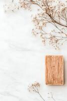 Natural Soap Bar with Dried Flowers on White Marble for Zero Waste Living photo