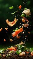 Food Scraps Fall Toward Dark Rich Soil Surface Concept Zero Waste Living Organic Matter Decomposition photo