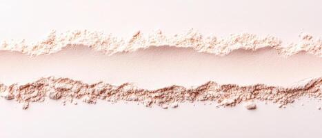 Scattered beige crumbs form rough lines. Light powder ingredient for gluten free low carb sweets. Food ingredient preparation for tasty desserts photo