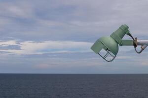 A light pole on the side of a boat photo