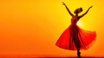 Dancer in a flowing red dress celebrates the sunset in a vast field, radiating joy and energy during golden hour, a vibrant performance enveloped by warm hues photo