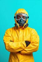 Person wearing a yellow protective suit and a gas mask, posing confidently against a bright blue background photo