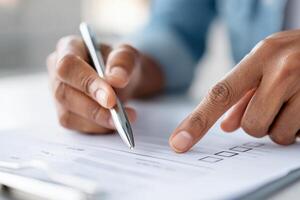 Hands pointing at a task checklist highlighting the importance of delegating responsibilities effectively photo