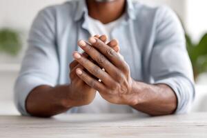 Close-up of hands in a respectful gesture in a calm and peaceful setting photo