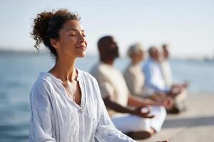 Joyful community practices meditation by a vibrant lake enhancing serenity and mindfulness photo