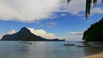 Cloudy beach and mountains video