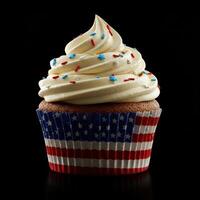 Patriotic american flag cupcake with vanilla frosting and sprinkles photo