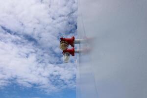 A close up of a fire hydrant and a light bulb photo