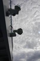 A view of a sky with clouds and a sun photo