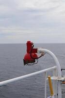 A red fire hydrant on a boat photo