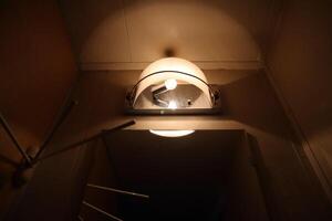 A light fixture in a room photo