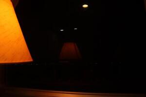 A lamp sitting on a table photo
