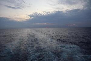 A view of the ocean from a ship photo
