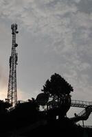 A large tower with a large crane on top photo
