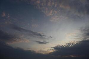 A person is flying a kite in the sky photo