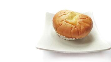 Double cheese bread on white plate isolated on white background photo